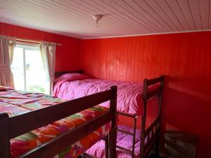 Postel nebo postele na pokoji v ubytování 2 Arenas de Ancud