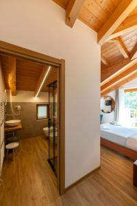 Postel nebo postele na pokoji v ubytování Agriturismo Donec