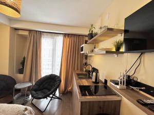 TV a/nebo společenská místnost v ubytování Room 416