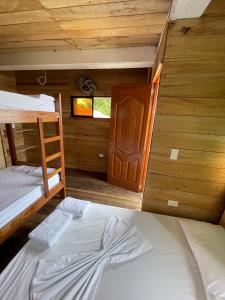 Postel nebo postele na pokoji v ubytování Petra Hotel