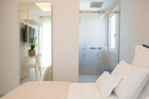 Letto o letti in una camera di Scirocco Boutique Eco Hotel