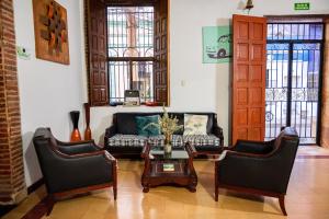 Khu vực ghế ngồi tại Hotel La Palma Centro Histórico