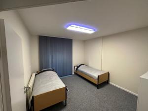 Postel nebo postele na pokoji v ubytování AMT Hotel Hamburg