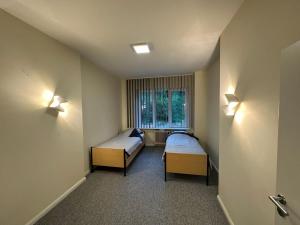 Postel nebo postele na pokoji v ubytování AMT Hotel Hamburg
