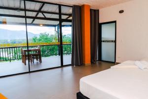 Postel nebo postele na pokoji v ubytování Casa Hotel Cautiva