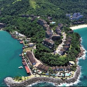 an aerial view of an island in the water at Porto Real Resort - Apto 3 Suites - Por do Sol Genial in Mangaratiba