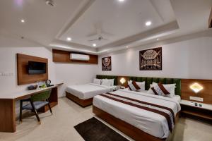 Giường trong phòng chung tại Soil to Soul Trinity Hotel - A Boutique Stay