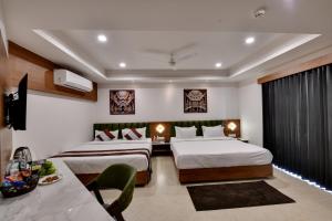 Giường trong phòng chung tại Soil to Soul Trinity Hotel - A Boutique Stay