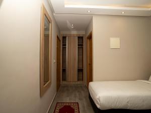 Voodi või voodid majutusasutuse HOTEL CAFE PALAIS SALAM , Beni Mellal toas