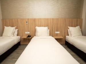 Voodi või voodid majutusasutuse HOTEL CAFE PALAIS SALAM , Beni Mellal toas