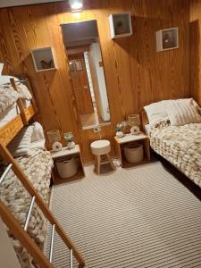 Postel nebo postele na pokoji v ubytování Appartamenti Vacanze Casa -Residence Albare - check in Vacanze Casa - Marilleva 900