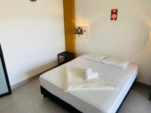 Postel nebo postele na pokoji v ubytování Casa Hotel Cautiva