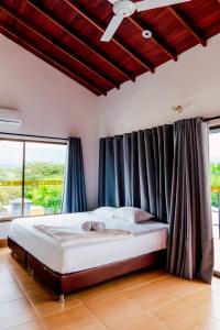 Postel nebo postele na pokoji v ubytování Casa Hotel Cautiva