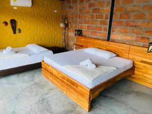 Postel nebo postele na pokoji v ubytování Casa Hotel Cautiva