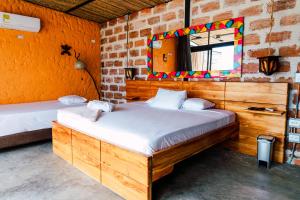 Postel nebo postele na pokoji v ubytování Casa Hotel Cautiva