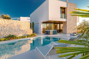 Πισίνα στο ή κοντά στο Villa Carolea