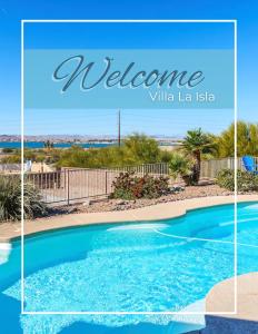 a welcome sign for a villa la isla with a swimming pool at Villa La Isla PANORAMIC VIEWS, Outdoor Kitchen, sleeps 16 in Lake Havasu City