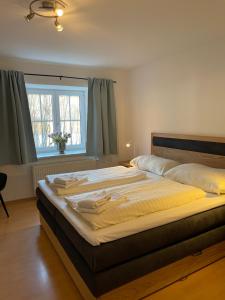 Posteľ alebo postele v izbe v ubytovaní Hotel Aloisia, Hotel Garni