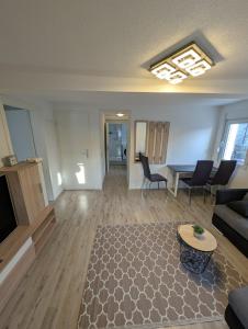a living room with a couch and a table at 2 Room apartment in Göppingen