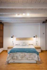 A bed or beds in a room at El Peregrino Llanes VUT
