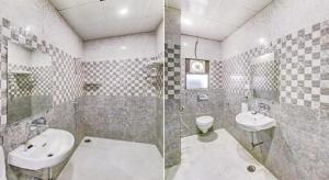 a bathroom with a sink and a toilet and a mirror at King Heritage in Lucknow