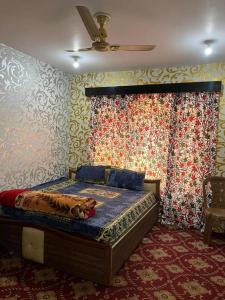 Voodi või voodid majutusasutuse Hotel Kashmir Heaven toas