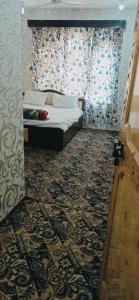 Voodi või voodid majutusasutuse Hotel Kashmir Heaven toas