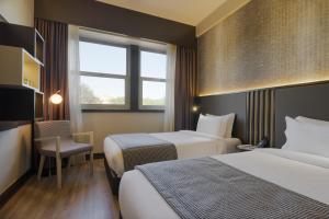Voodi või voodid majutusasutuse HF Fenix Lisboa toas