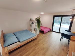 Postel nebo postele na pokoji v ubytování Apartmán Matylda - Deštné v Orlických horách