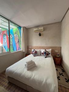 Postel nebo postele na pokoji v ubytování Riad dar lfen