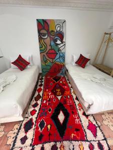 Postel nebo postele na pokoji v ubytování Riad dar lfen