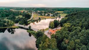 an aerial view of a river with a bridge at Przystanek Tleń in Tleń