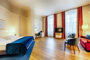 TV a/nebo společenská místnost v ubytování Welcome Hotel Residenzschloss Bamberg