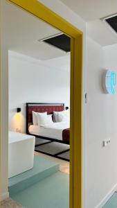 Postel nebo postele na pokoji v ubytování Kartuli Hotel