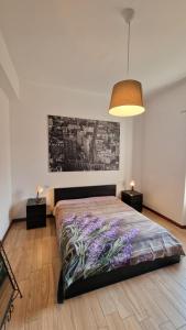 Postel nebo postele na pokoji v ubytování Appartamento Giardino Como Quarcino House