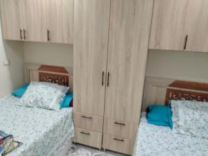 Postel nebo postele na pokoji v ubytování EL Hosary House + 2 fotografie