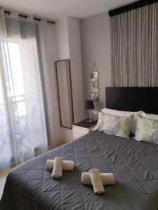 Posteľ alebo postele v izbe v ubytovaní Dénia Centro Puerto + 17 fotografií