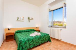 Posteľ alebo postele v izbe v ubytovaní Camia Etna House