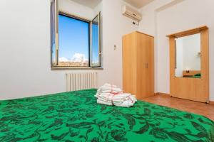 Posteľ alebo postele v izbe v ubytovaní Camia Etna House