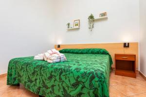 Posteľ alebo postele v izbe v ubytovaní Camia Etna House
