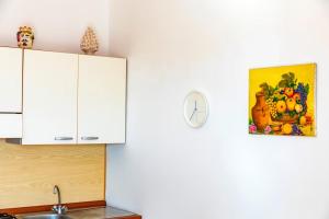 Kuchyňa alebo kuchynka v ubytovaní Camia Etna House