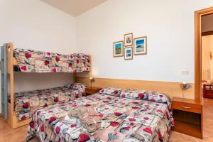 Posteľ alebo postele v izbe v ubytovaní Camia Etna House