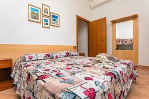 Posteľ alebo postele v izbe v ubytovaní Camia Etna House