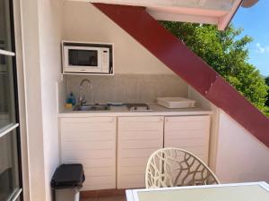 Cuina o zona de cuina de Kaza douce logement 2 chambres dans un village vacance