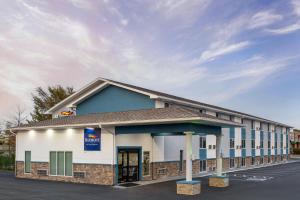 a rendering of the front of a hotel at Baymont Inn & Suites by Wyndham in Liberty