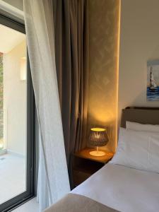 Postel nebo postele na pokoji v ubytování Pelagus Luxury Villas