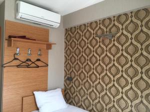 Postel nebo postele na pokoji v ubytování Okur Otel