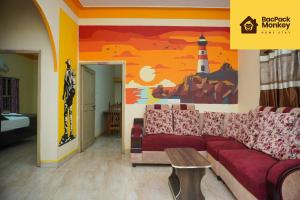 Postel nebo postele na pokoji v ubytování Bacpack Monkey HomeStay
