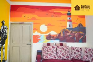 Postel nebo postele na pokoji v ubytování Bacpack Monkey HomeStay