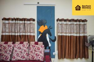 Posezení v ubytování Bacpack Monkey HomeStay